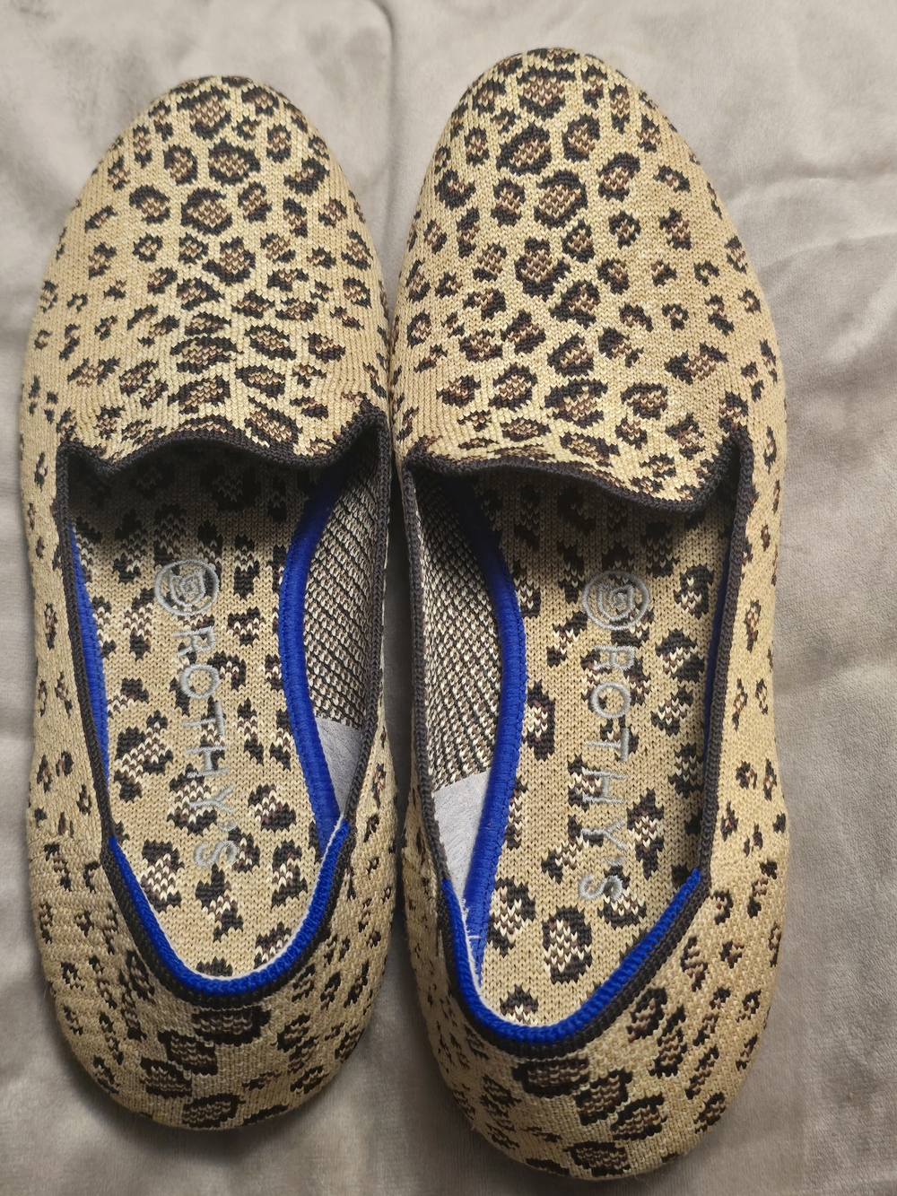 Rothy's Leopard Print Tan Flats with Blue Trim